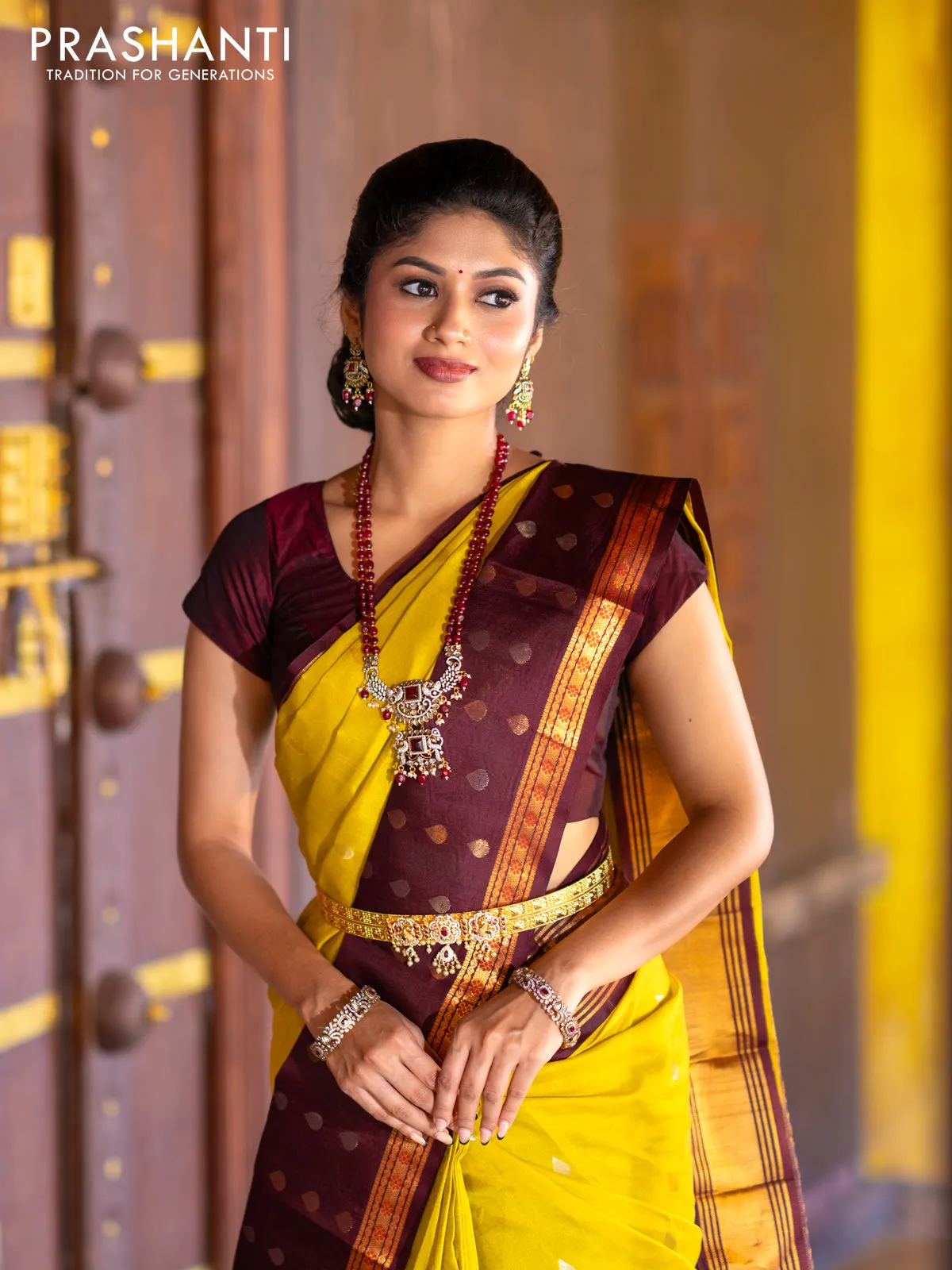 Kuppadam silk cotton saree lime yellow and deep maroon with silver & gold zari woven tilak buttas and temple design rettapet zari woven butta border